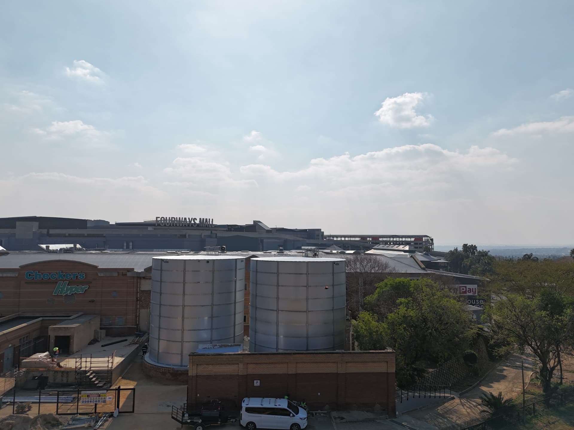 Twin Videx branded cylindrical Aluzinc bulk water storage tanks at Fourways Mall